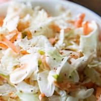 Cole Slaw · Shredded cabbage and carrots in a creamy mayo dressing.