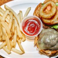 Brisket Burger · Triple grind brisket, BBQ sauce, onion rings, and Pepper Jack.