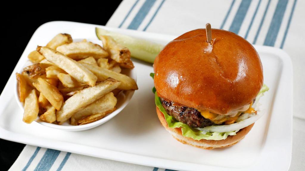 Kezar Burger & Fries · Lettuce, tomato, onion, pickle, Thousand Island, served with French fries.