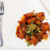 Chicken Curry Or Vindaloo · Fresh chicken, delicately prepared in light gravy. Vindaloo is additional of spicy potatoes ...