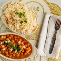 Chana Masala · A delicious combination of chickpeas, onions, and tomatoes in a rich sauce.