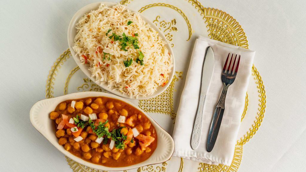 Chana Masala · A delicious combination of chickpeas, onions, and tomatoes in a rich sauce.