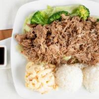 Kalua Pork · Slow roasted pork with a hint of smokey flavor, served shredded over steamed cabbage. Hawaii...