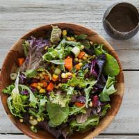 Yogi Salad · Fresh greens with chopped raw veggies, beans, corn, fried chickpea puffs and citrus dressing...
