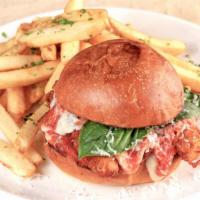 Chicken Parmesan Sandwich · Free-range chicken breaded and fried, covered in house tomato sauce and mozzarella cheese, s...