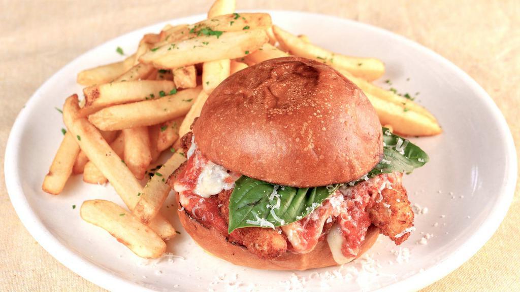 Chicken Parmesan Sandwich · Free-range chicken breaded and fried, covered in house tomato sauce and mozzarella cheese, served on a brioche bun.
