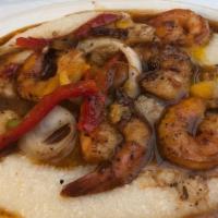 Shrimp and grits · creamy grits loaded with some juicy shrimp