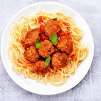 Spaghetti With Meatball · Classic Italian spaghetti with beef meatballs in a tomato sauce. Served with two fresh garli...