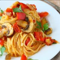 The Veggie Spaghetti · Classic vegetarian spaghetti with mixed vegetables on sizzling warm spaghetti pasta.