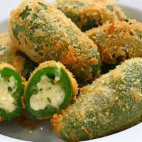 Jalapeño Poppers · Crispy jalapeño poppers filled with cream cheese.