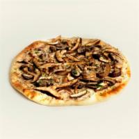 Mushroom Flatbread · Melted vegan mozzarella and parmesan with olive oil and roasted mushrooms on a delicious fla...