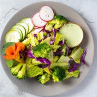 Lettuce Celebrate · Romaine, red cabbage, broccoli, cucumber, radish, cilantro, jalapeno cilantro dressing