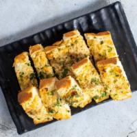 Garlic in the Bread · Add garlic cheese bread to go with your pasta. The perfect pairing.