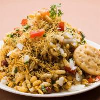 Chatpata Bhel · Puffed rice mixed with crispy wafers and topped with Chickpeas, Onion, Potato, Sev and sweet...