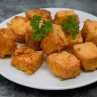 Fried Tofu · Deep-fried tofu served with sweet and sour sauce and crushed peanut.