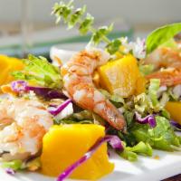 Mango Salad Prawn · Sliced green mango mix with spicy lime dressing, onion, and mint leaves.