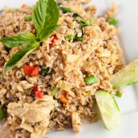 Thai Basil Fried Rice · Thai basil fried rice with garlic, chili, bell peppers, and yellow onions.