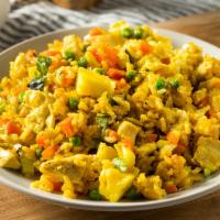 Pineapple Fried Rice · Minced chicken and prawn fried rice with garlic, curry powder, pineapple, cashew, resin, and...