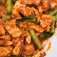 Pad Prik Kring · Sliced meat with green beans, bell peppers, carrot, basil, and chili paste.