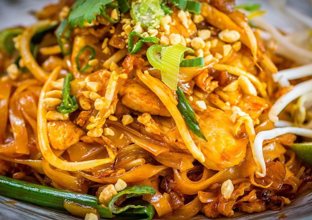 Pad Thai · Stir-fried rice noodles with meat, egg, tofu, bean sprouts, green onions, and ground peanut.