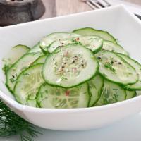 Cucumber Salad · Thinly sliced cucumbers and onion are tossed in a sweet and tangy vinaigrette for a classic ...