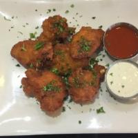 Buffalo Wings (6 pieces) · Fried buffalo wings served with ranch & hot sauce