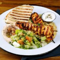 Chicken Kebab Plate · Grilled marinated chicken cubs. Served with hummus, rice and pita bread