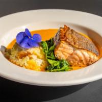 Crispy Skin Salmon · Tender & juicy salmon filet served with tasty pepper yam sauce drizzle, coconut rice, sautee...