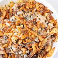 Chicken Truffle Shuffle · Truffly, mushroomy, cheesy. Cavatappi pasta mixed with truffle roasted mushroom, queso blanc...