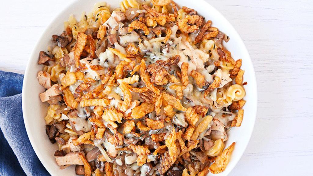 Chicken Truffle Shuffle · Truffly, mushroomy, cheesy. Cavatappi pasta mixed with truffle roasted mushroom, queso blanco, parmesan and Swiss cheese with roasted, diced chicken. Topped with crispy onion.