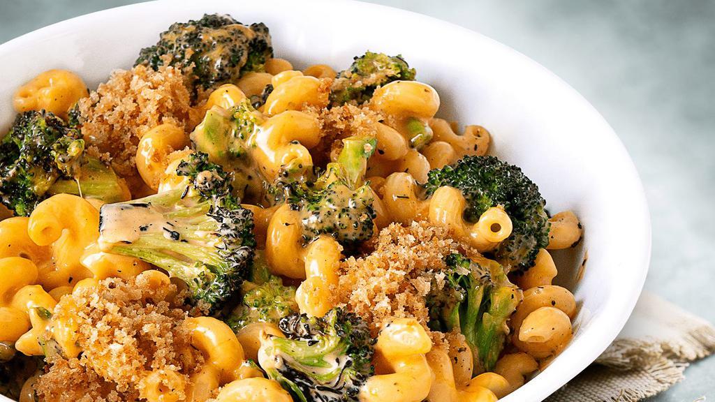 Broccoli Cheese Mac (Vegetarian) · Lightly charred broccoli and cavatappi pasta mixed with parmesan cheese, Swiss cheese, and white cheese sauce, topped with brown butter bread crumbs.