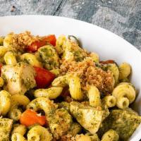 Pesto Chicken · Classic pesto pasta featuring cavatappi topped with Swiss and parmesan cheese, diced chicken...