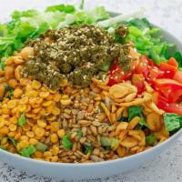 ZNS. Burmese Tea Leaf Salad (Vegan) · A mix of Burmese tea leaves, fried garlic, yellow beans, peanuts, sesame seeds, sunflower se...