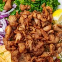 ZUB. Burmese Chicken Salad · Bite-sized fried chicken with red onions, yellow bean powder, cabbage, cilantro, fried wonto...