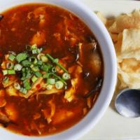 Hot & Sour Soup · Spicy. Shredded pork, bamboo shoots and bean curd in thickened chicken broth.