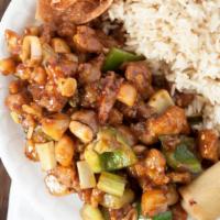 Kung Pao Chicken · Spicy.Tender chicken, water chestnuts, green peppers and onion in a spicy garlic sauce and c...