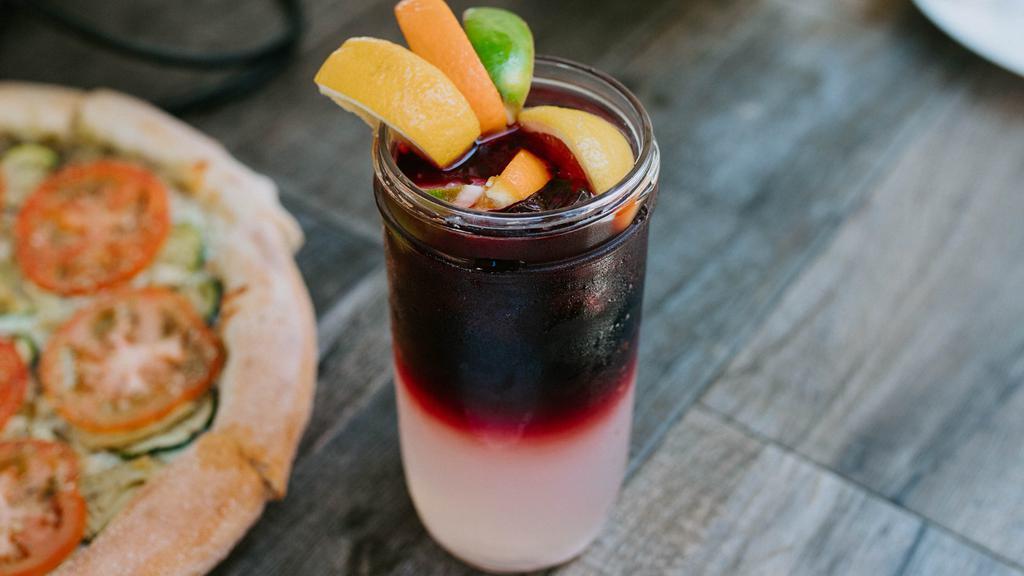 Our Famous Sangria · Our own home wine cooler with sweet sangria wine, fruit juices, and plenty of fresh fruit for flavor.