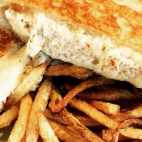 Crab Melt · Red Rock crab salad and swiss cheese melted between butter grilled sourdough.
