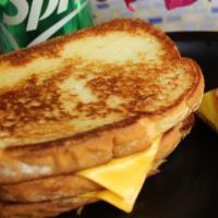 Grilled Cheese Sandwich · American cheese. White or whole wheat bread. Includes potato chips.