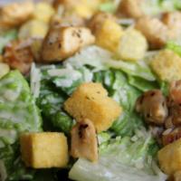 Caesar Salad · Classic Caesar salad made with romaine lettuce, seasoned croutons, parmesan cheese and Caesa...