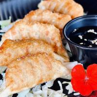 Gyoza · Deep fried chicken dumplings.
