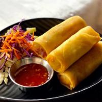Spring Roll · Vegetarian. Crispy spring rolls stuffed with vegetable served with sweet and sour sauce.