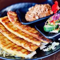 Chicken Satay (4) · Grilled marinated chicken served with cucumber salad and peanut sauce.