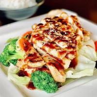 CHICKEN TERIYAKI · .Grilled marinated chicken breast over rice with steam mix vegetable topped teriyaki sauce