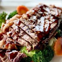 BEEF TERIYAKI · Grilled marinated  steak over rice with steam mix vegetable topped teriyaki sauce