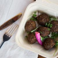 Falafel  · House-made & served with our signature tahini & chili sauce