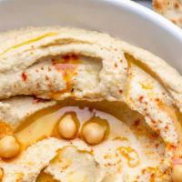 Hummus · Pita Bread Included (1 for small, 2 for medium, 3 for large)