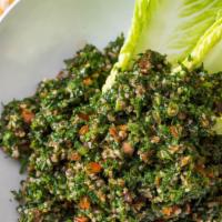 Tabbouleh Salad · Finely Chopped Parsley, Tomato, Bulgur,  Lemon & Olive Oil Vinaigrette.