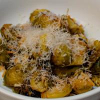 Brussel Sprouts · roasted with butter, garlic, parmesan, crispy shallots