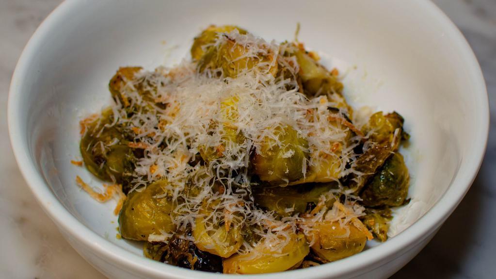 Brussel Sprouts · roasted with butter, garlic, parmesan, crispy shallots